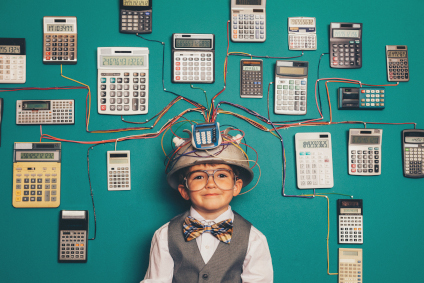 Little child funnily connected to calculators.